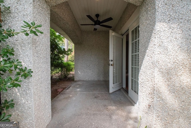 view of patio featuring ceiling fan
