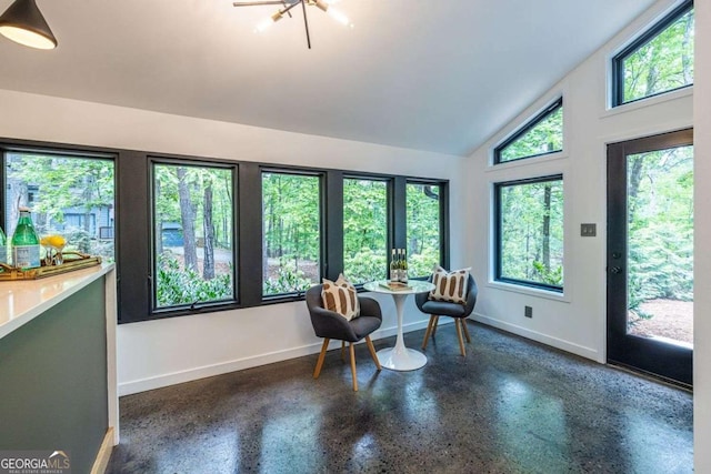 sunroom / solarium with vaulted ceiling