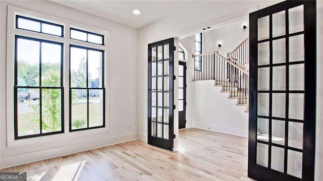 2346 E Maddox Rd, Buford, GA 30518 - entryway with french doors, baseboards, healthy amount of natural light, and recessed lighting