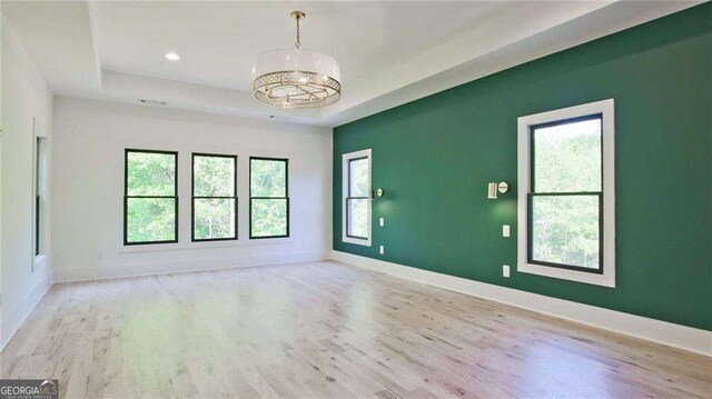 2346 E Maddox Rd, Buford, GA 30518 - spare room featuring healthy amount of natural light, wood finished floors, baseboards, and recessed lighting