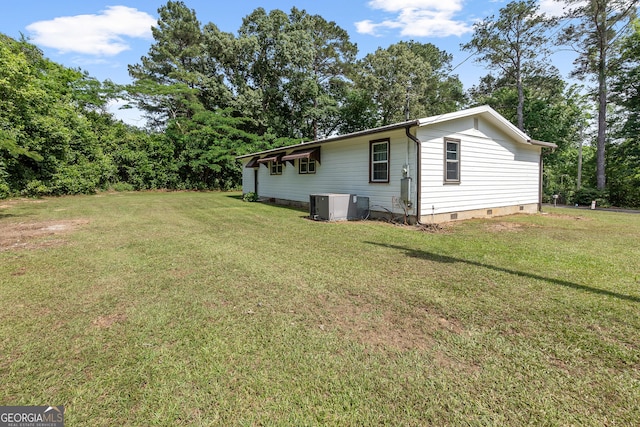 144 Bryant Rd, Cordele, GA 31015 - view of side of property featuring crawl space, a yard, and cooling unit