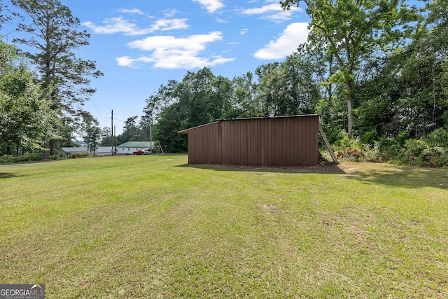 144 Bryant Rd, Cordele, GA 31015 - view of green lawn with an outdoor structure