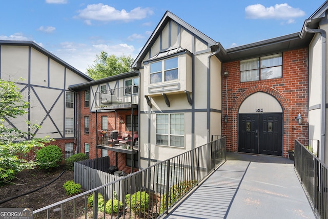6851 Roswell Rd Unit K-23, Atlanta, GA 30328 - view of front of house with brick siding and stucco siding
