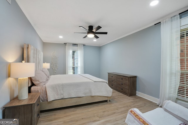 6851 Roswell Rd Unit K-23, Atlanta, GA 30328 - bedroom with light wood-type flooring, crown molding, baseboards, recessed lighting, and a ceiling fan