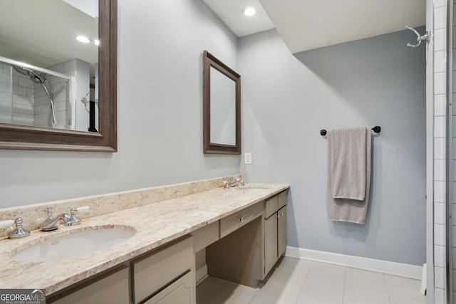 6851 Roswell Rd Unit K-23, Atlanta, GA 30328 - full bathroom with double vanity, tiled shower, baseboards, and tile patterned flooring