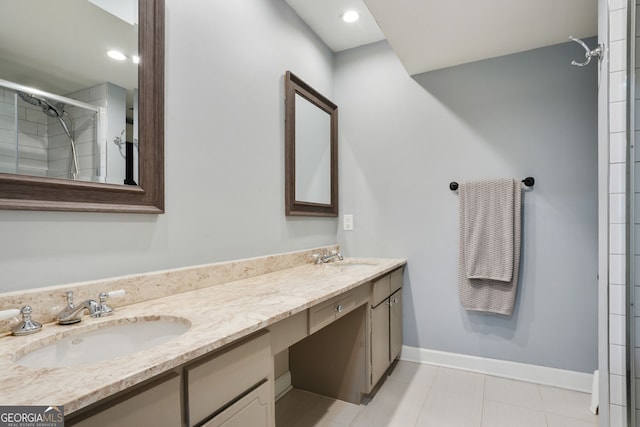 6851 Roswell Rd Unit K-23, Atlanta, GA 30328 - bathroom with double vanity, tiled shower, and tile patterned floors
