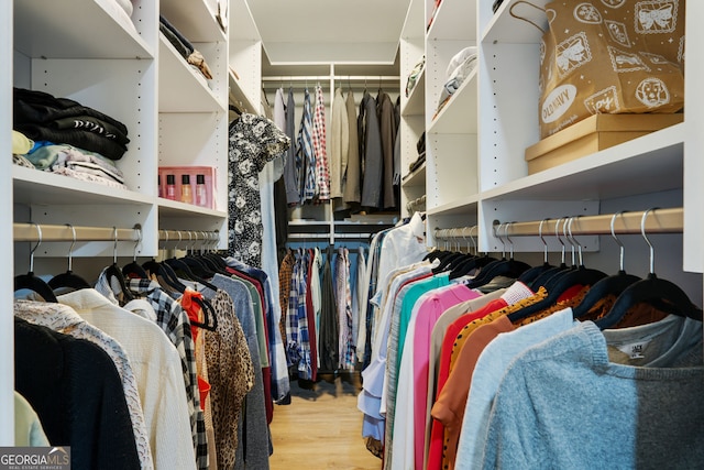 6851 Roswell Rd Unit K-23, Atlanta, GA 30328 - walk in closet with wood finished floors