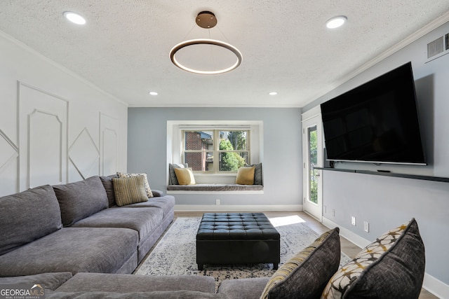 6851 Roswell Rd Unit K-23, Atlanta, GA 30328 - living room with a textured ceiling, crown molding, baseboards, and recessed lighting