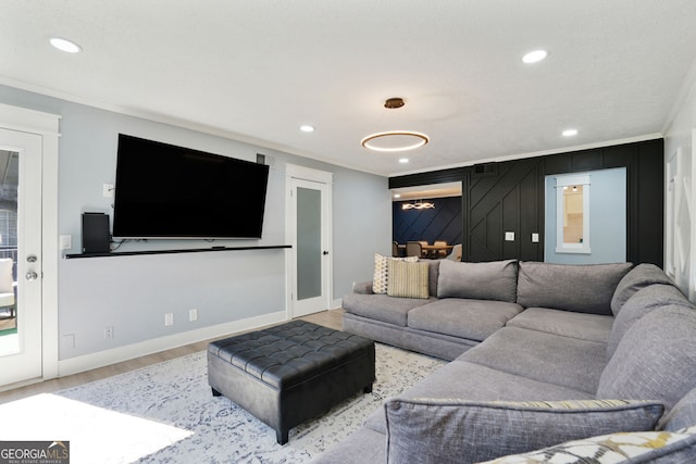 6851 Roswell Rd Unit K-23, Atlanta, GA 30328 - living room with wood finished floors, ornamental molding, recessed lighting, and baseboards