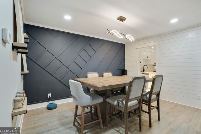 6851 Roswell Rd Unit K-23, Atlanta, GA 30328 - dining area featuring light wood-type flooring and recessed lighting