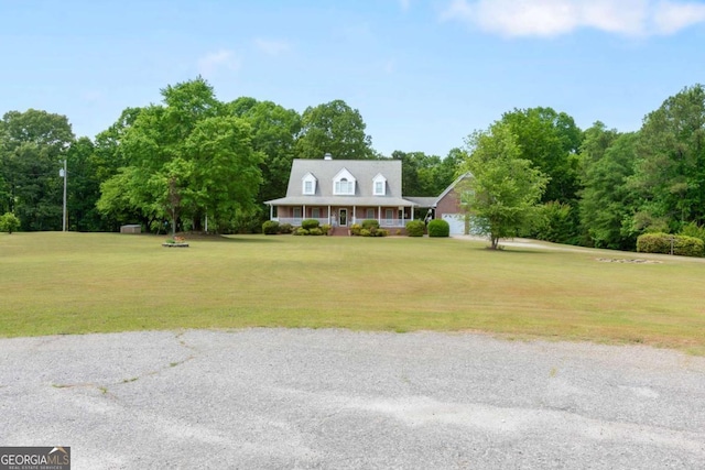 view of front of house featuring a front lawn and a porch