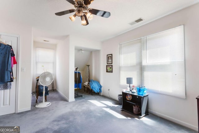 bedroom with carpet floors, baseboards, and a ceiling fan