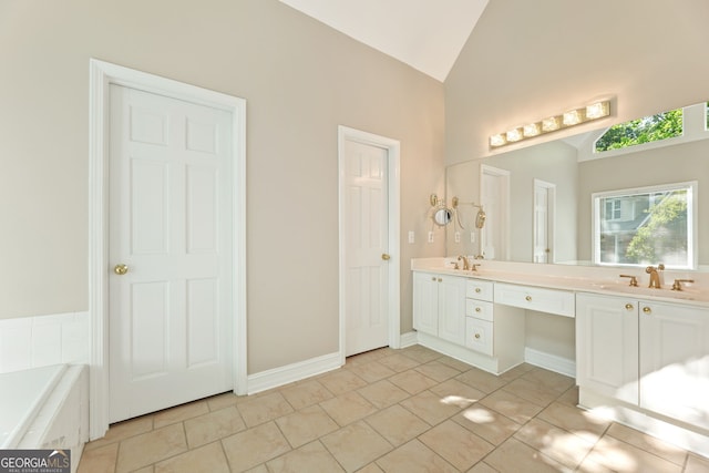 full bath featuring double vanity, high vaulted ceiling, and a bathtub