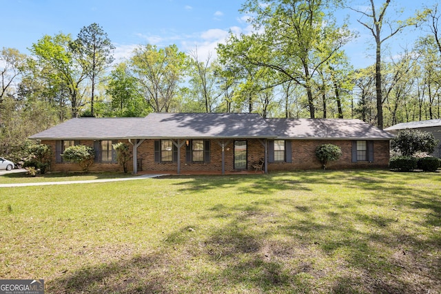 182 Quail Hollow Ln, Fort Valley, GA 31030 - single story home featuring a front yard and brick siding