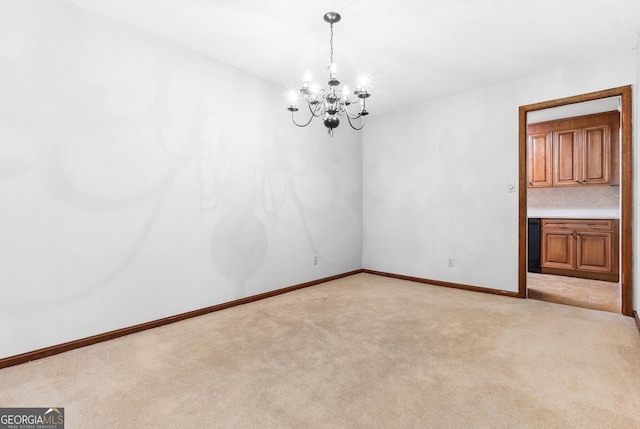 182 Quail Hollow Ln, Fort Valley, GA 31030 - empty room featuring a chandelier, light colored carpet, and baseboards