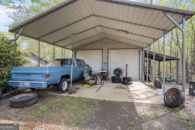 182 Quail Hollow Ln, Fort Valley, GA 31030 - view of vehicle parking with a garage