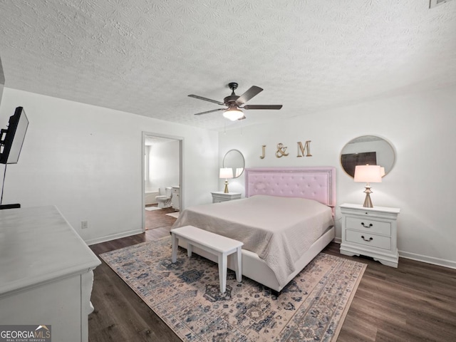 5293 Hopewell Ln, Gainesville, GA 30507 - bedroom with dark wood-style floors, a textured ceiling, baseboards, ensuite bathroom, and ceiling fan