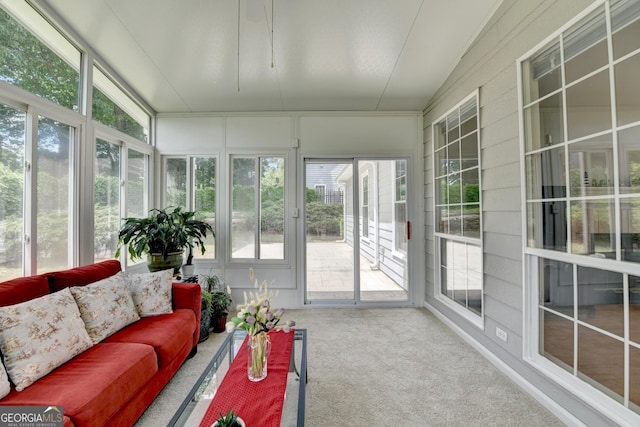 sunroom / solarium featuring an outdoor hangout area and healthy amount of natural light