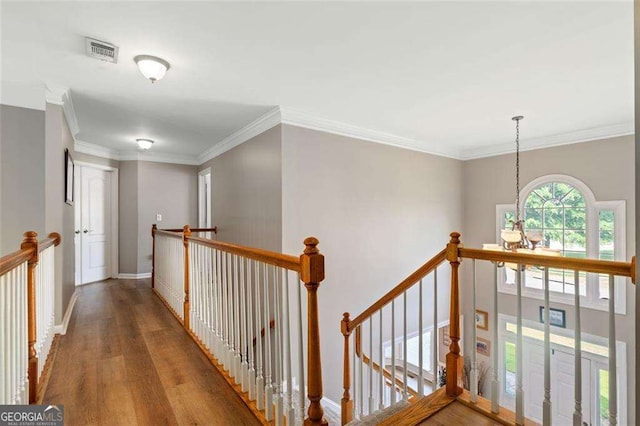 3705 Rolling Creek Dr, Buford, GA 30519 - corridor with an upstairs landing, wood finished floors, a chandelier, crown molding, and baseboards