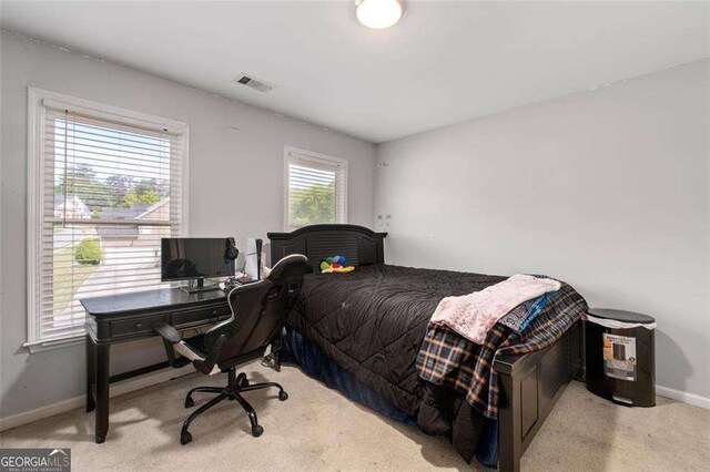 3705 Rolling Creek Dr, Buford, GA 30519 - carpeted bedroom featuring baseboards and an office area
