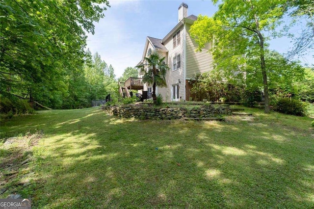 3705 Rolling Creek Dr, Buford, GA 30519 - view of green lawn featuring a wooden deck