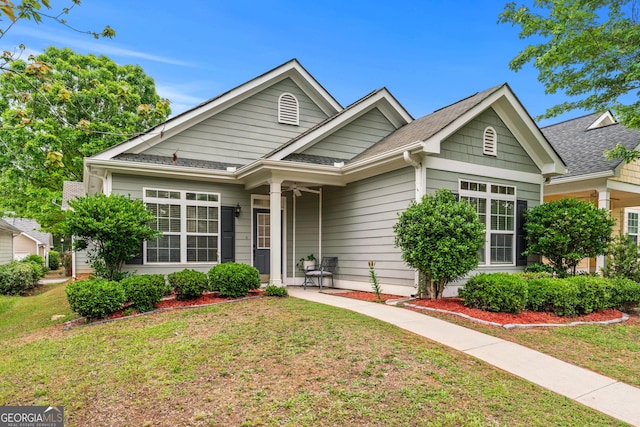 6045 Park Close, Fairburn, GA 30213 - view of front of house featuring a front yard and a shingled roof