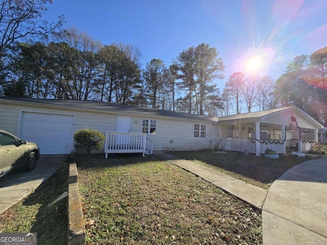 507 Jefferson Hwy, Winder, GA 30680 - ranch-style house featuring covered porch, driveway, and an attached garage