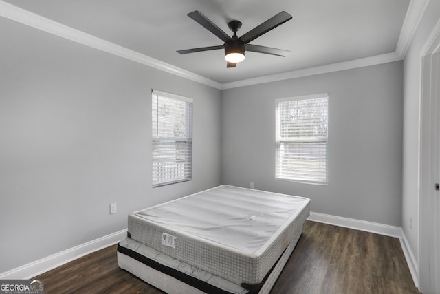 1560 Sarah M Harden Dr, Atlanta, GA 30311 - bedroom featuring crown molding, baseboards, dark wood-type flooring, and a ceiling fan