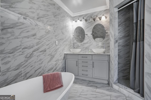 1560 Sarah M Harden Dr, Atlanta, GA 30311 - bathroom featuring crown molding, marble finish floors, tile walls, double vanity, and tiled shower