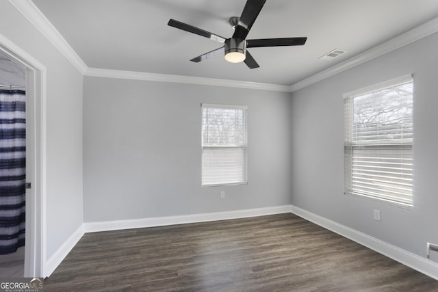 1560 Sarah M Harden Dr, Atlanta, GA 30311 - spare room featuring healthy amount of natural light, crown molding, a ceiling fan, and dark wood-type flooring