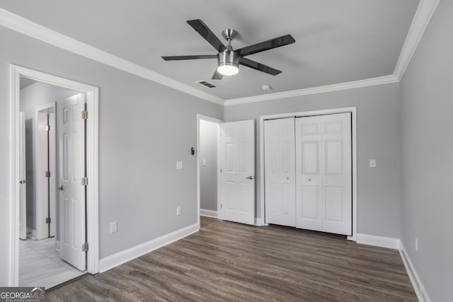 1560 Sarah M Harden Dr, Atlanta, GA 30311 - unfurnished bedroom featuring ornamental molding, wood finished floors, baseboards, a closet, and ensuite bath
