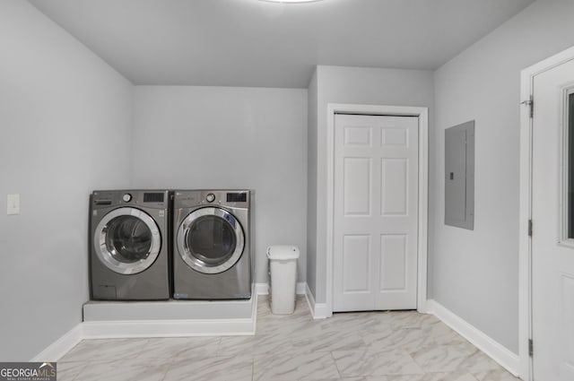 1560 Sarah M Harden Dr, Atlanta, GA 30311 - washroom featuring electric panel, washer and clothes dryer, marble finish floors, and baseboards