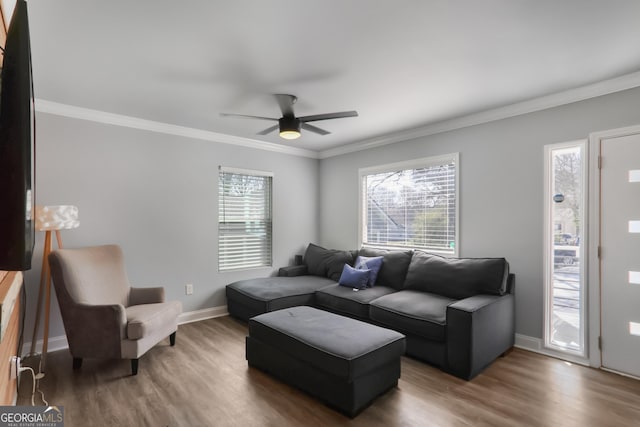 1560 Sarah M Harden Dr, Atlanta, GA 30311 - living room with wood finished floors, baseboards, ceiling fan, and crown molding