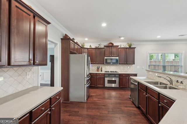 1840 Brighton Blvd SE, Atlanta, GA 30316 - kitchen with appliances with stainless steel finishes, a sink, backsplash, light countertops, and ornamental molding