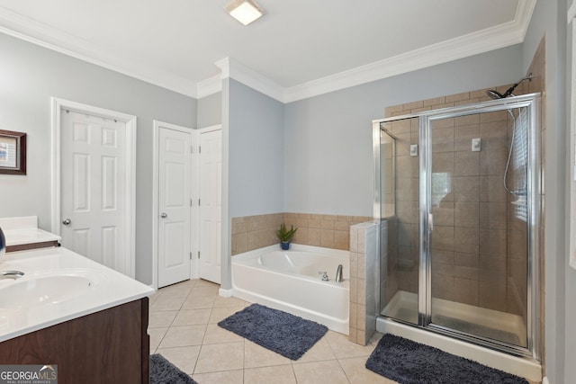 1840 Brighton Blvd SE, Atlanta, GA 30316 - full bathroom featuring tile patterned floors, a shower stall, crown molding, a bath, and double vanity