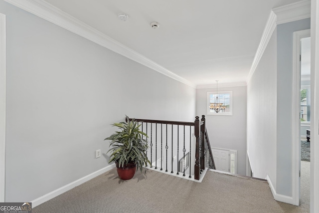 1840 Brighton Blvd SE, Atlanta, GA 30316 - corridor featuring an upstairs landing, carpet floors, ornamental molding, a chandelier, and baseboards