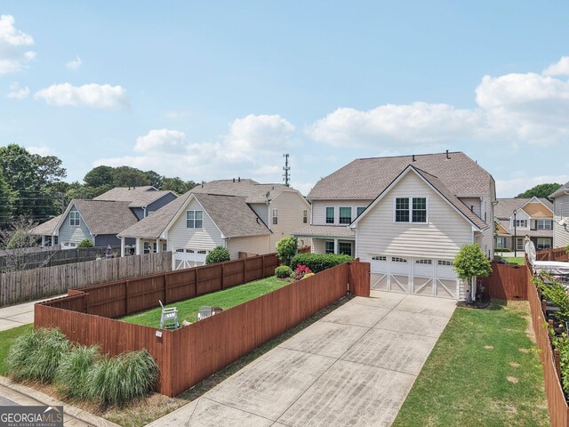 1840 Brighton Blvd SE, Atlanta, GA 30316 - traditional home featuring an attached garage, concrete driveway, and a residential view
