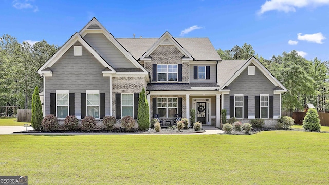 craftsman-style house with a shingled roof