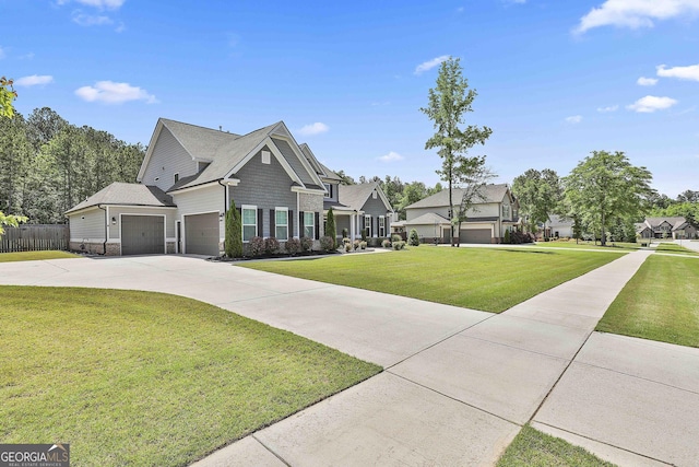 view of front facade with driveway, a garage, and a residential view