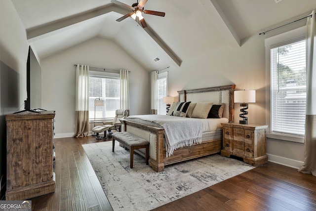 bedroom with multiple windows, hardwood / wood-style floors, and baseboards