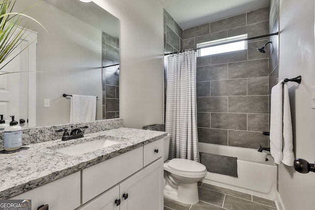bathroom with toilet, vanity, tile patterned floors, and shower / bath combination with curtain