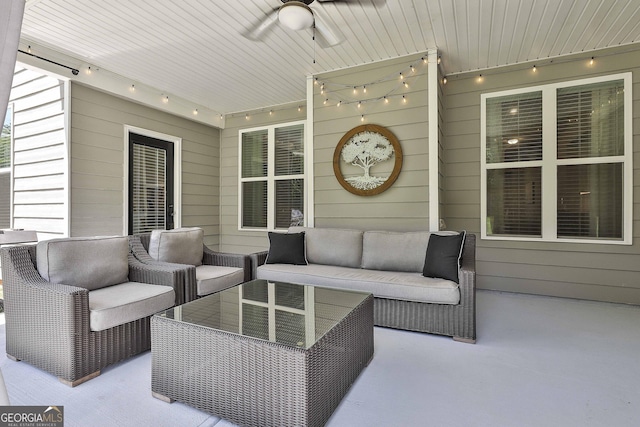 view of patio / terrace with an outdoor living space and ceiling fan