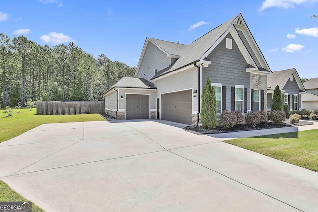view of property exterior with an attached garage, stone siding, and concrete driveway