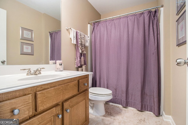 4765 Smokestone Dr, Douglasville, GA 30135 - bathroom with vanity, toilet, and a shower with shower curtain
