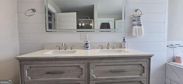 bathroom featuring double vanity