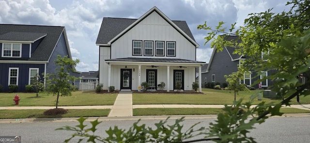 326 Barrow Ln, Grovetown, GA 30813 - view of front facade featuring board and batten siding, a porch, ceiling fan, and a standing seam roof