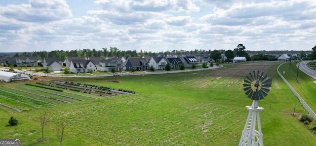 surrounding community with a residential view