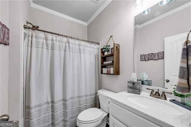 bathroom with ornamental molding, vanity, toilet, and a shower with shower curtain