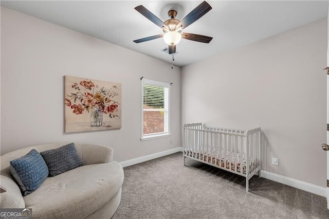 bedroom with carpet, baseboards, and ceiling fan
