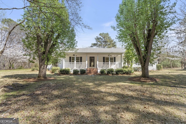 5695 Sweetbriar Trl, Macon, GA 31210 - bungalow-style home featuring a ceiling fan, a porch, and a front yard